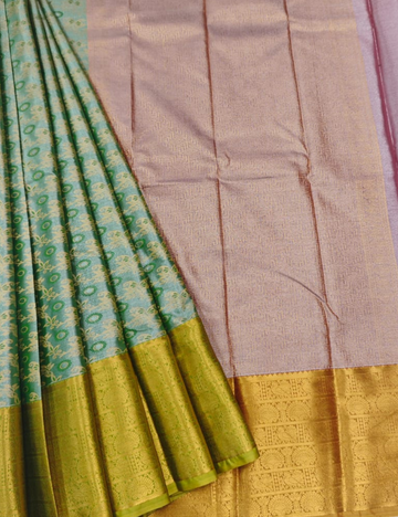 Grand Look Muted Green Tissue Semi Silk Saree