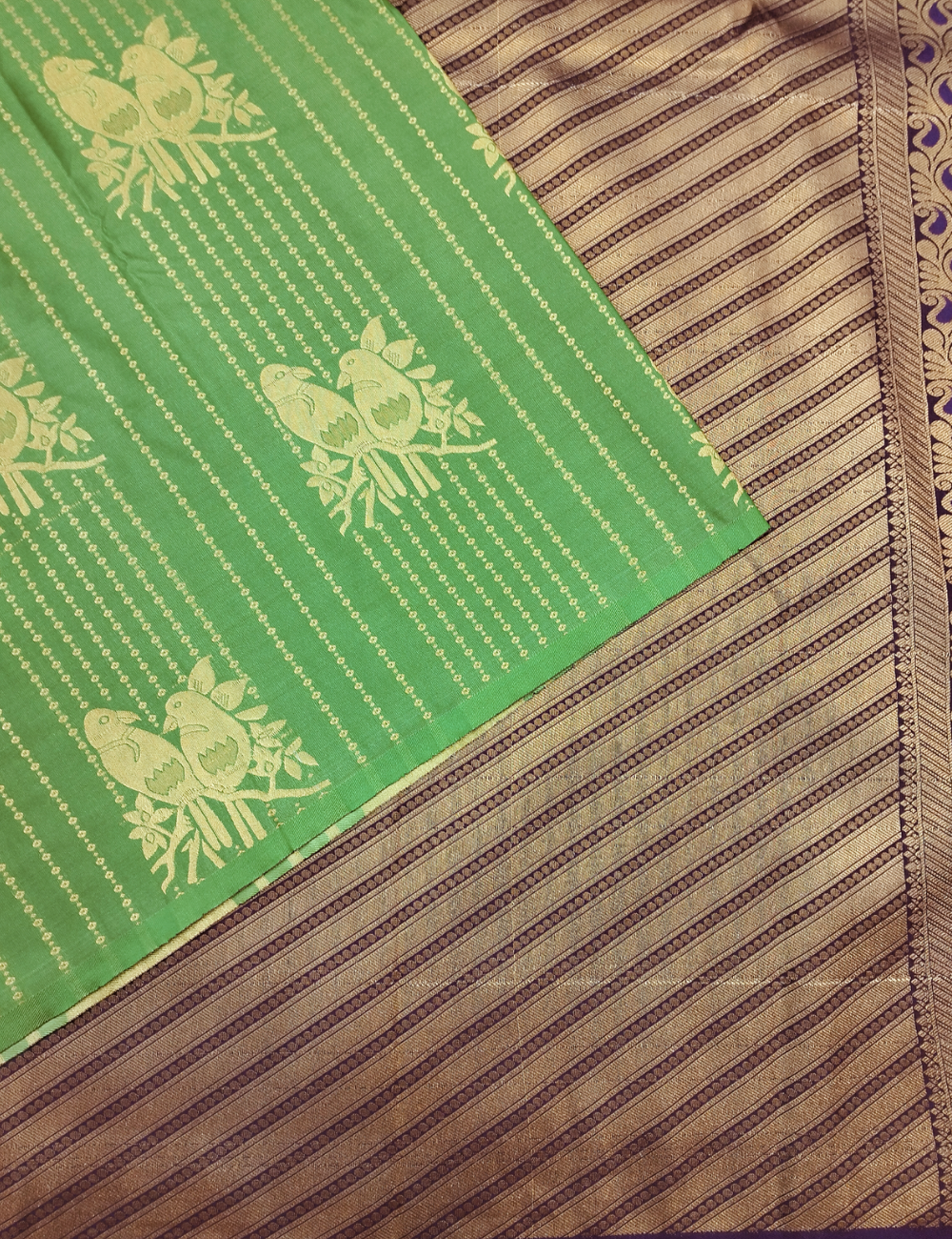 Parrot green with parrot motifs soft silk