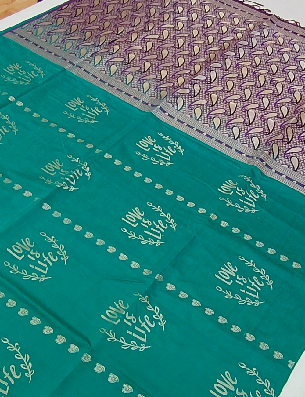 Love is Life Motifs With Teal Blue Green Colour Borderless Soft Silk Saree