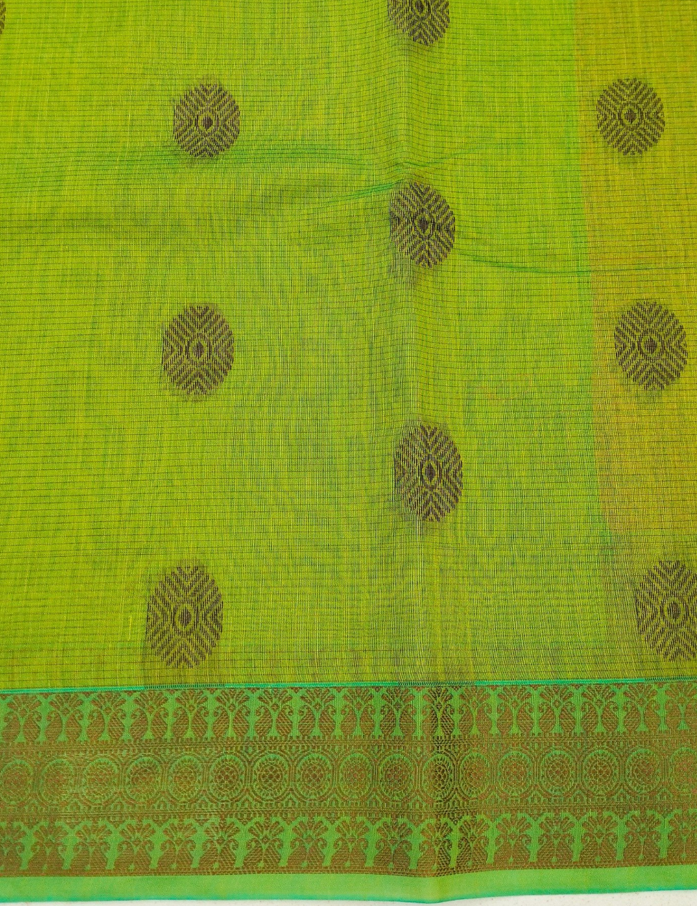 Round woven motifs with light forest green bamboo cotton