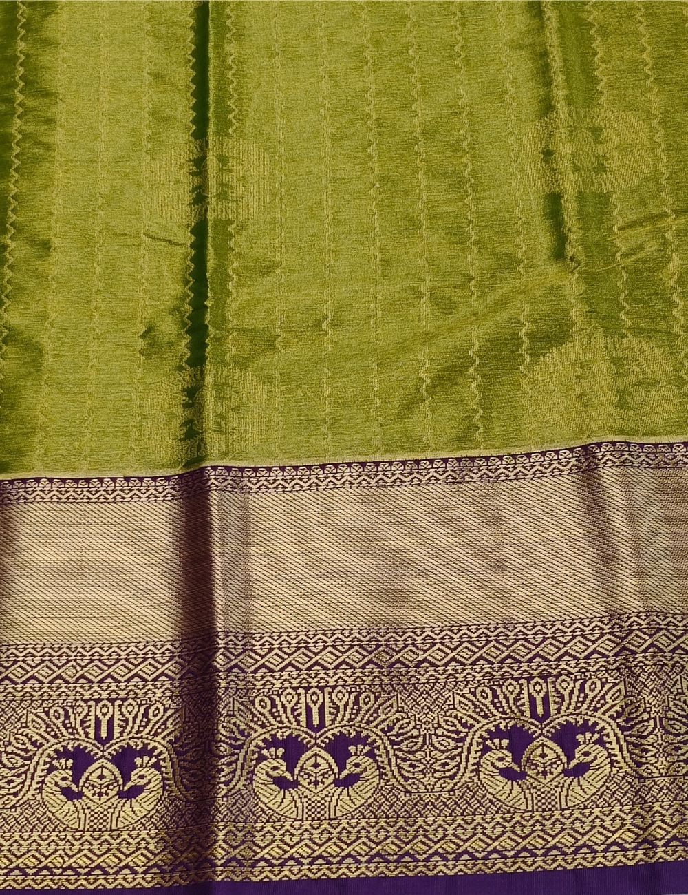 Wavy Motifs Muted Green Tissue Semi Silk Saree
