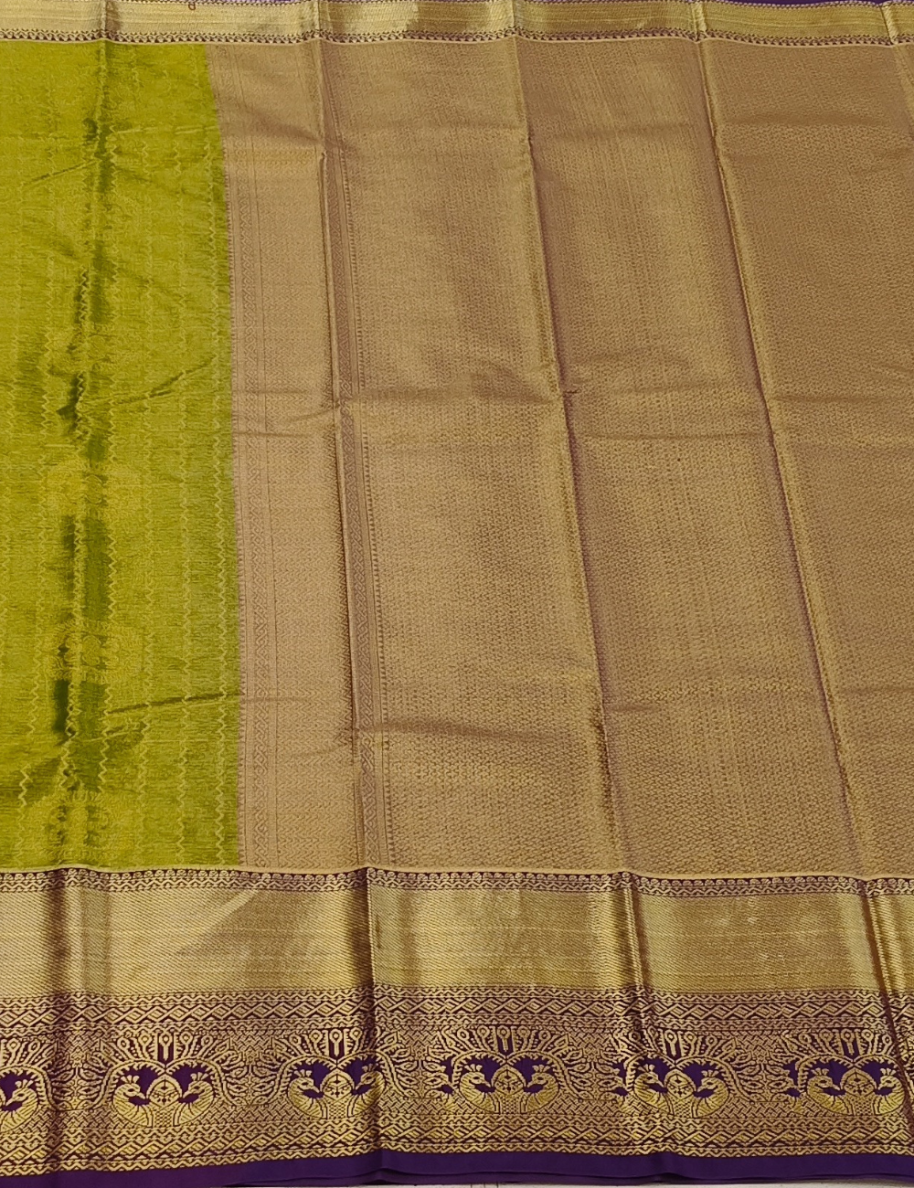 Wavy Motifs Muted Green Tissue Semi Silk Saree