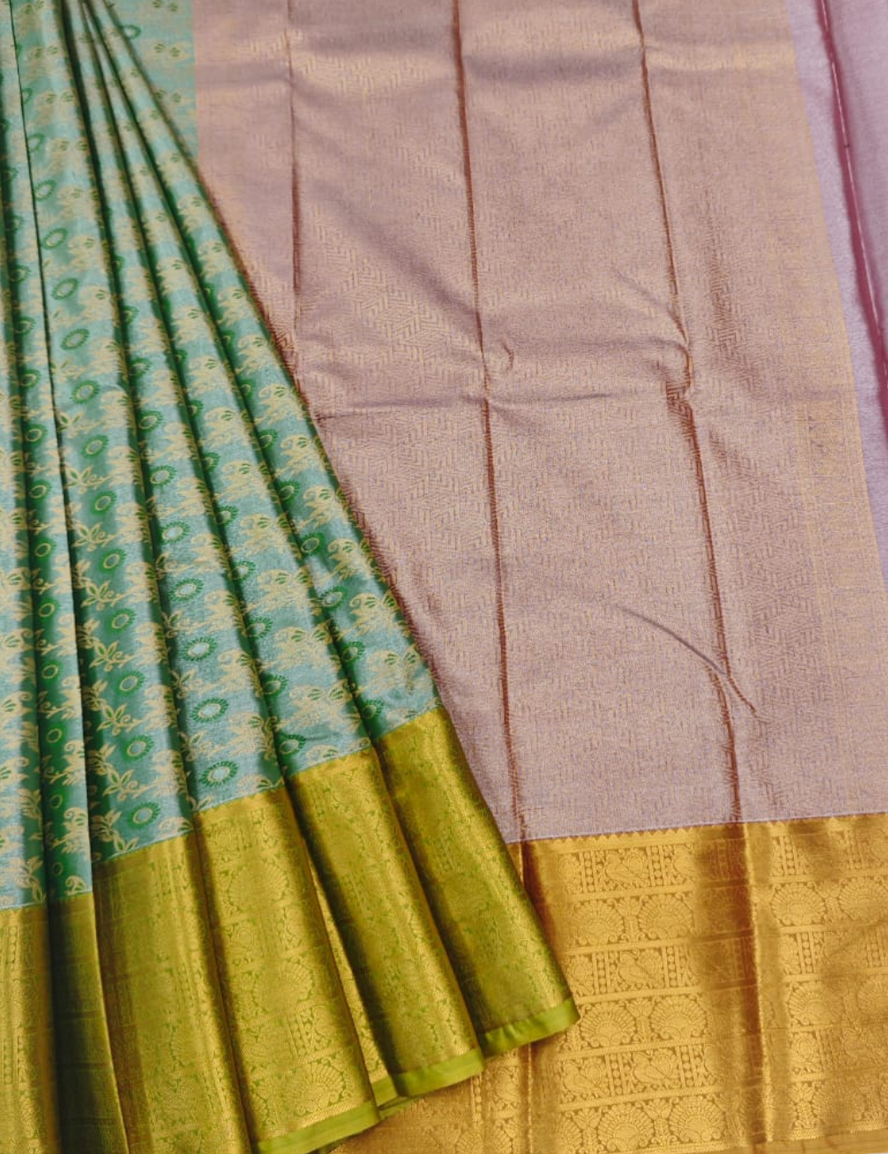 Grand Look Muted Green Tissue Semi Silk Saree