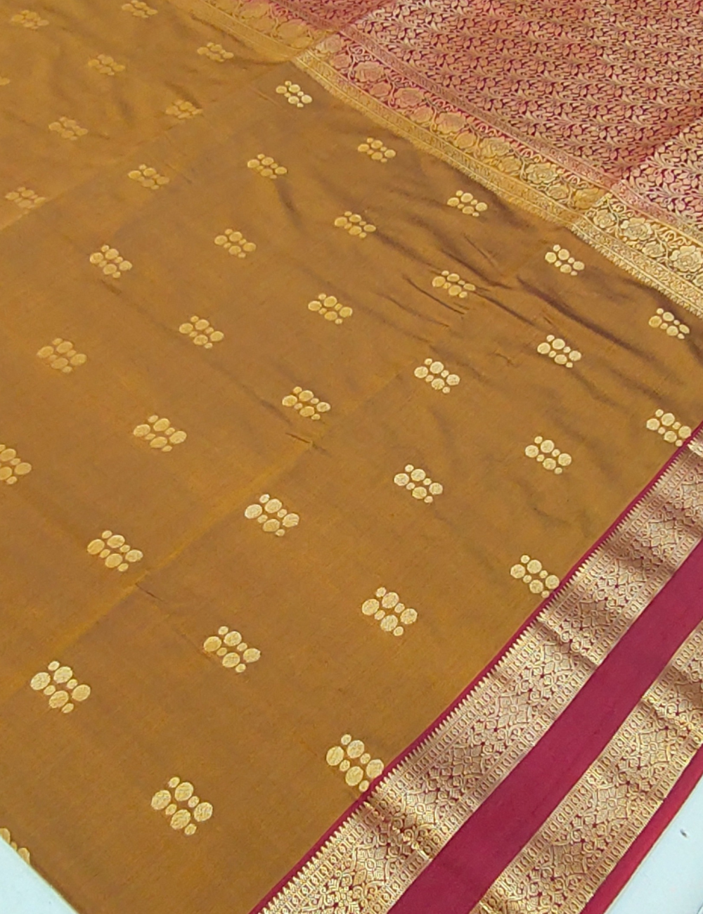 Coin chain motifs with Rettapet border warm brown colour soft silk