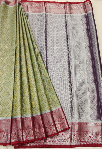 Circular Motifs Greenish Yellow Dual Tone Tissue Silk Saree