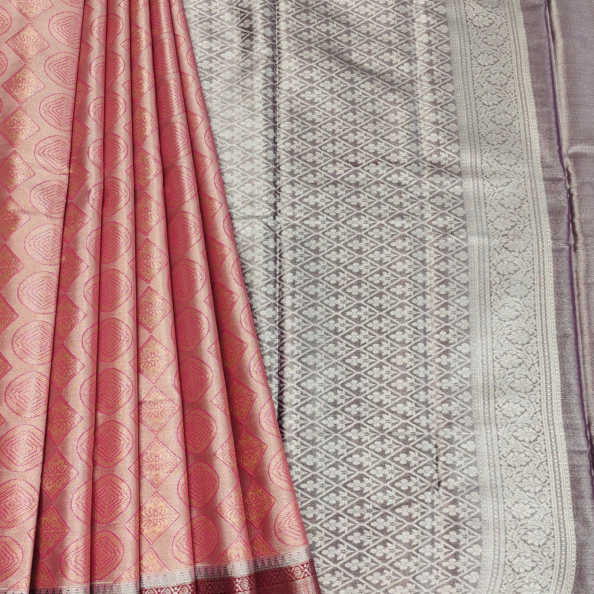 Circular Motifs Pale Orange Dual Tone Tissue Silk Saree