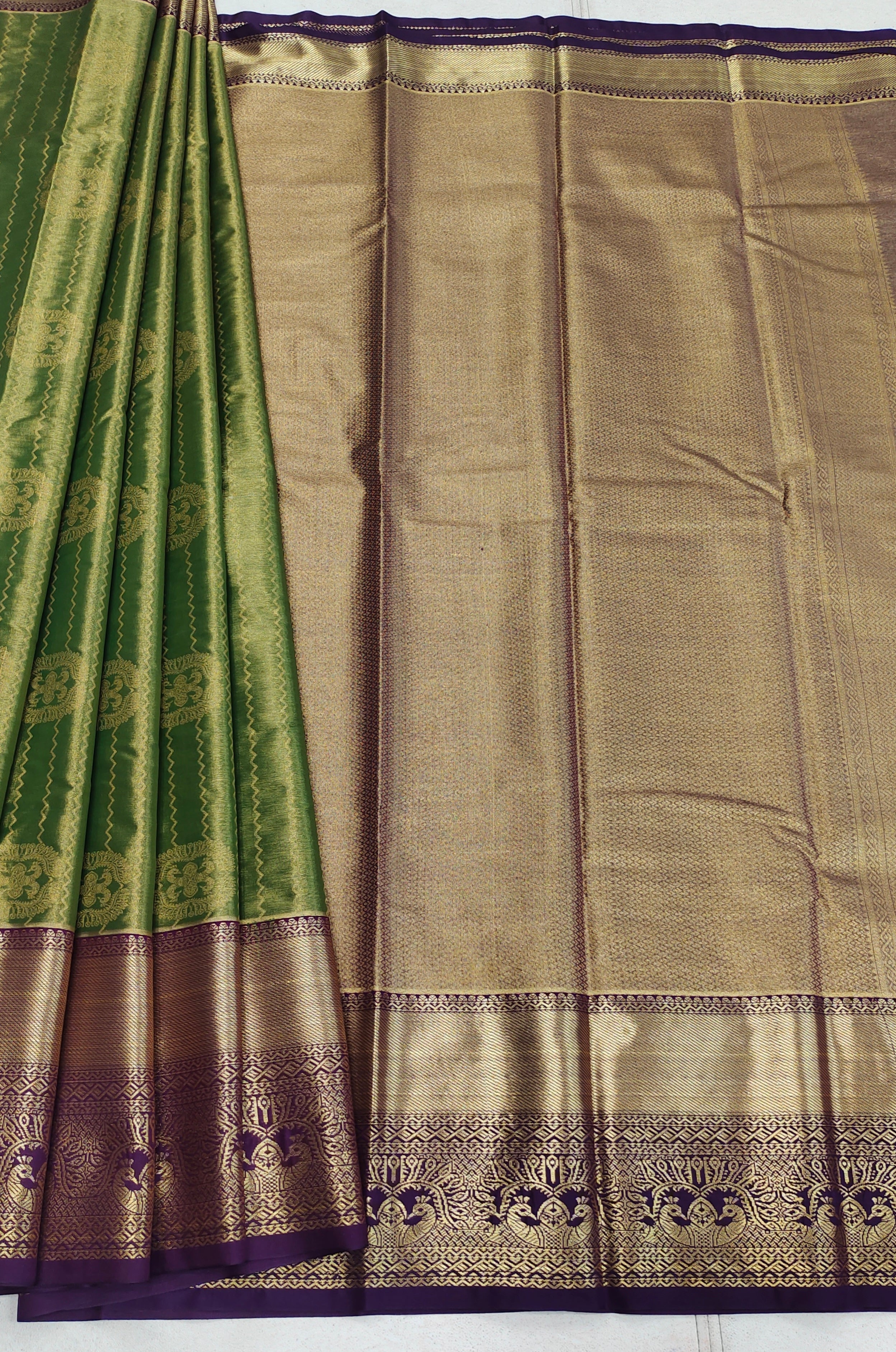 Wavy Motifs Muted Green Tissue Semi Silk Saree
